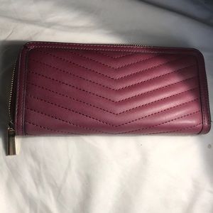 A  •n e w  •d a y. Burgandy wallet